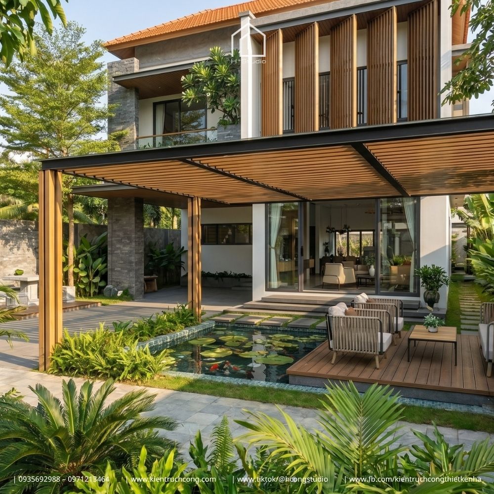 Biệt thự 2 tầng 10x25m hiện đại: Không gian sống xanh với sân vườn và hồ cá thư giãn - Hình ảnh 8